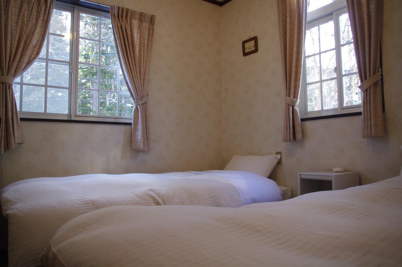 Bed and Breakfast Sunny Side Hut Хакуба-Мура Экстерьер фото